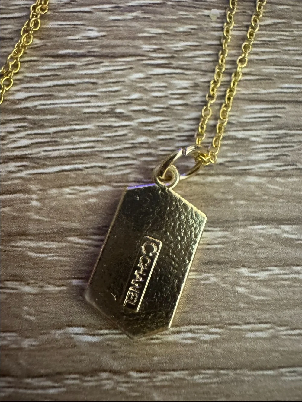 Chanel Black and Gold Lipstick Pendant Necklace
